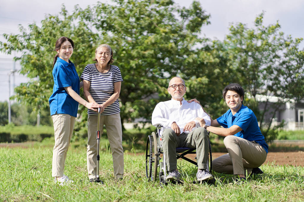 Happy group of people with caregivers